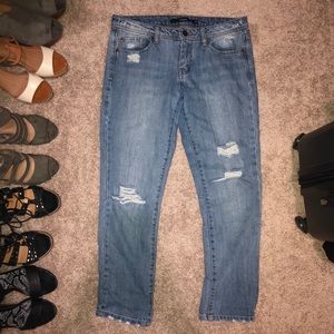 Distressed denim jeans